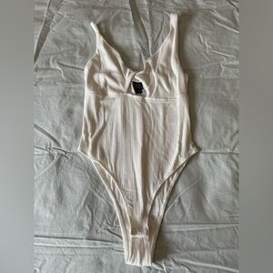 Wild Fable Ribbed Asymmetric Sleeve Bodysuit